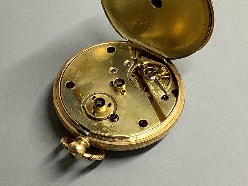 An 18k yellow metal open faced pocket watch, case diameter 38mm, gross 47 grams.